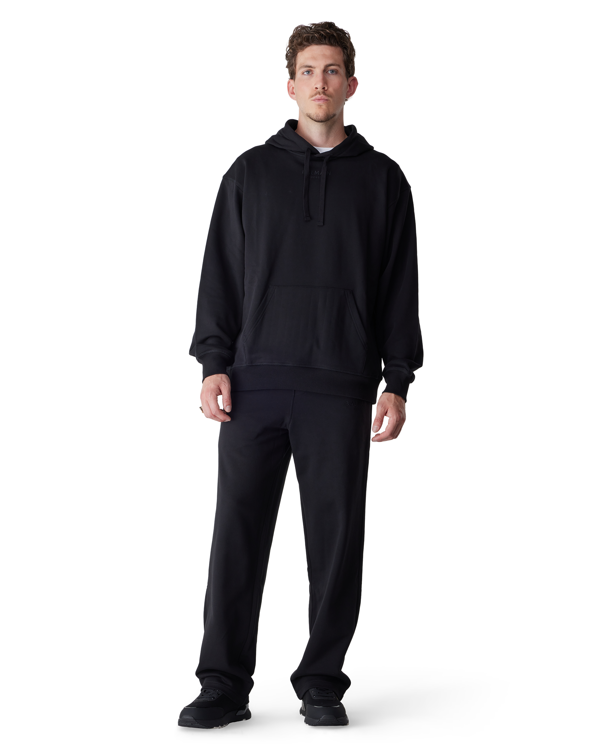 Black Polyurethane Logo Dynamic Sneakers by Versace Jeans Couture | DIHSAN