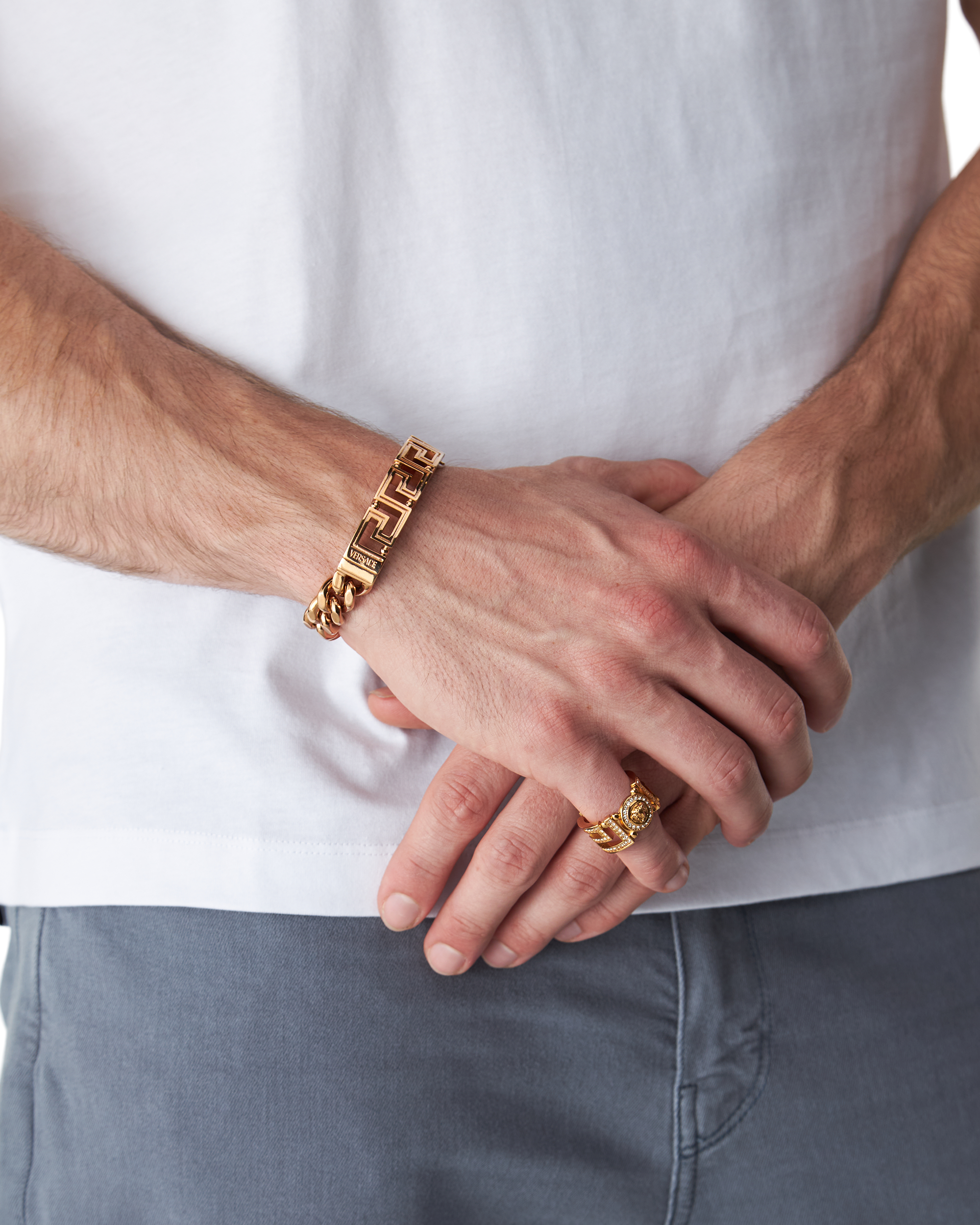 Light Gold Brass Greca Chain Bracelet by Versace | DIHSAN