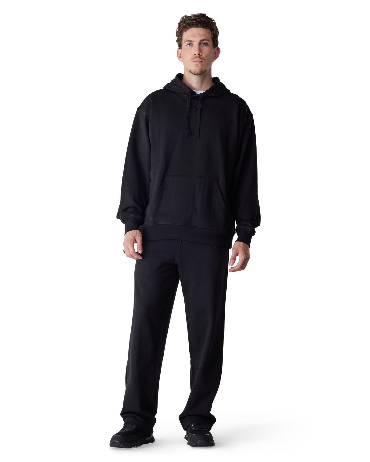 Black Polyurethane Logo Dynamic Sneakers by Versace Jeans Couture | DIHSAN